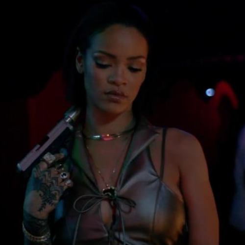 Rihanna holding gun